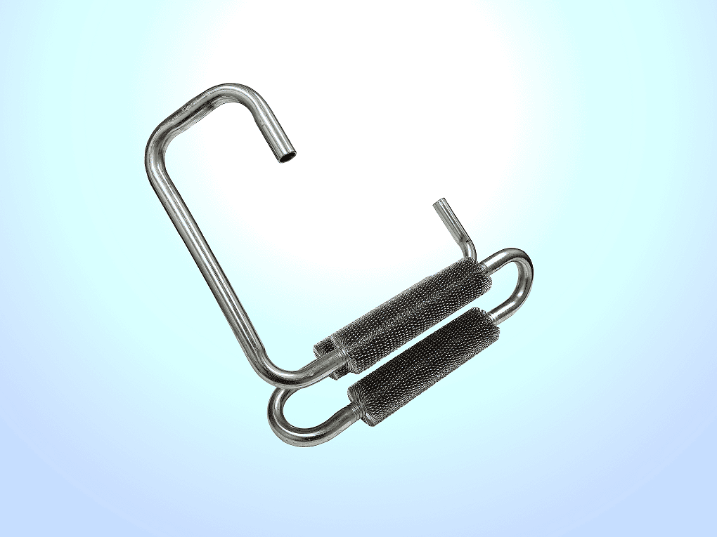 Photo of a wire wound aluminium automotive heat exchanger with several bends, showing a more complex shape.