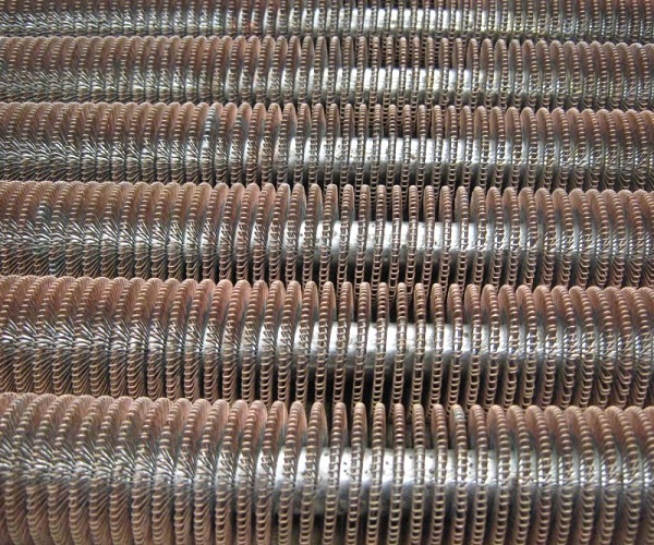 Photo of a batch of Wire Wound tubes, copper fin on steel tube.
